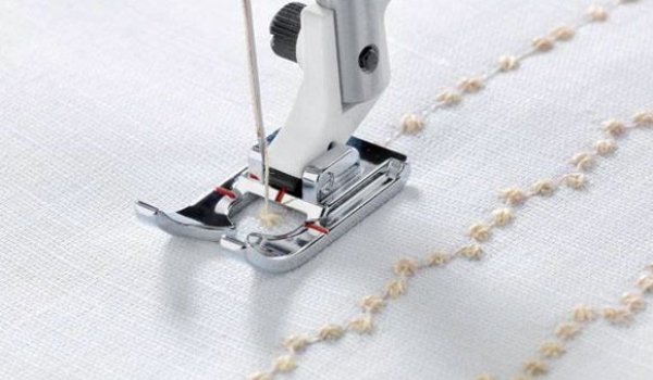 Mynd af Candlewicking fótur Husqvarna