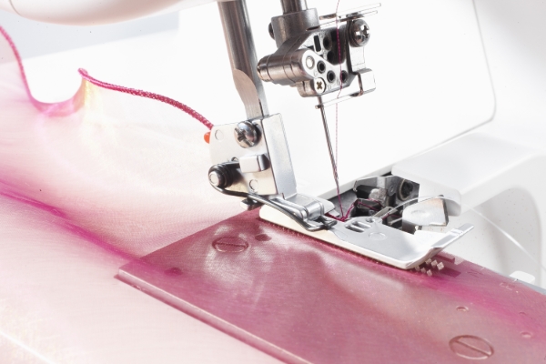 Mynd af Pífufótur fyrir overlockvélar Husqvarna