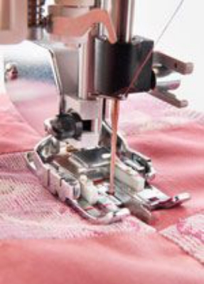 Mynd af Beinsaumsfótur með miðjustýringu Husqvarna